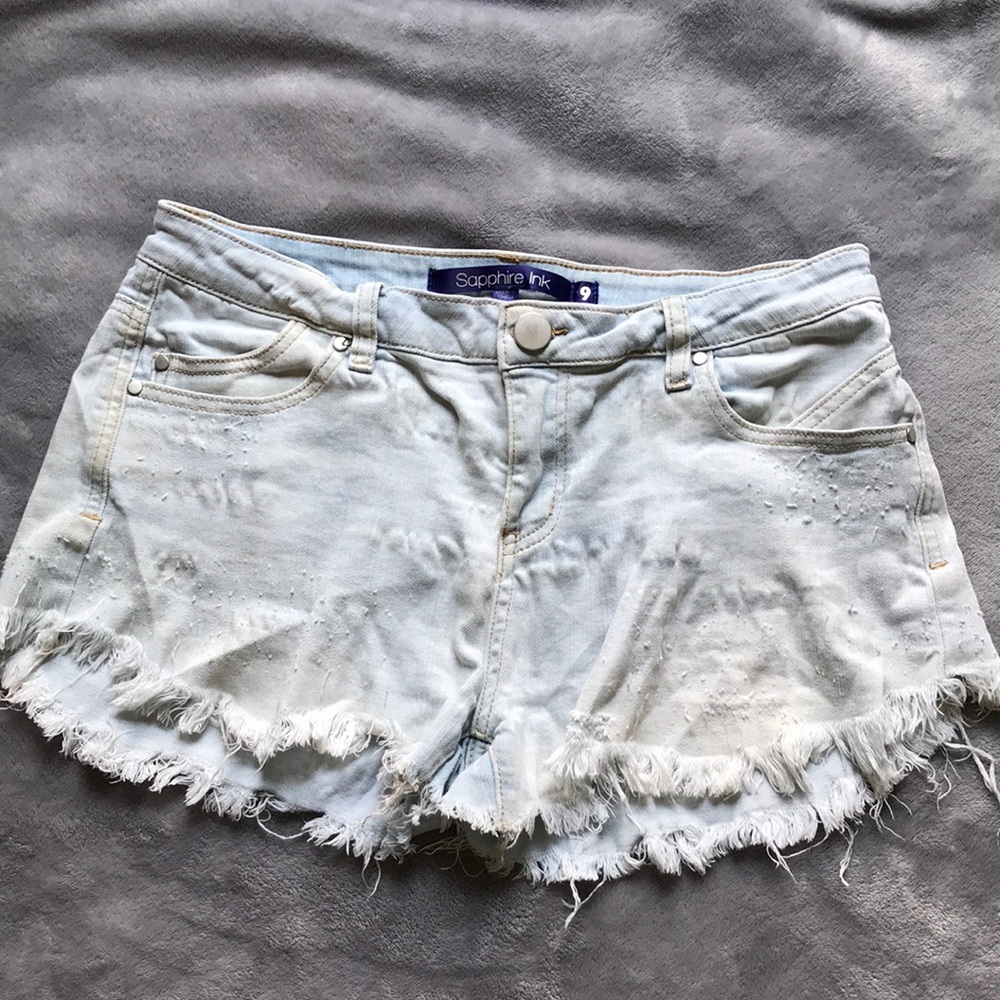 Light wash distressed shorts